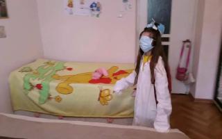 Cute Girl in a Surgical Mask