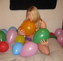 Women having fun with balloons